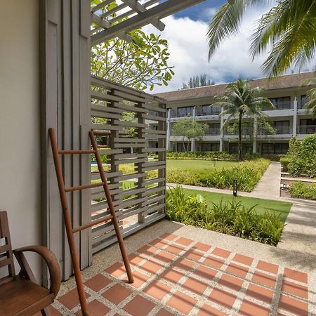 Outrigger Khao Lak Beach Resort - Sha Extra Plus מראה חיצוני תמונה A view of the hotel's grounds from a guest room