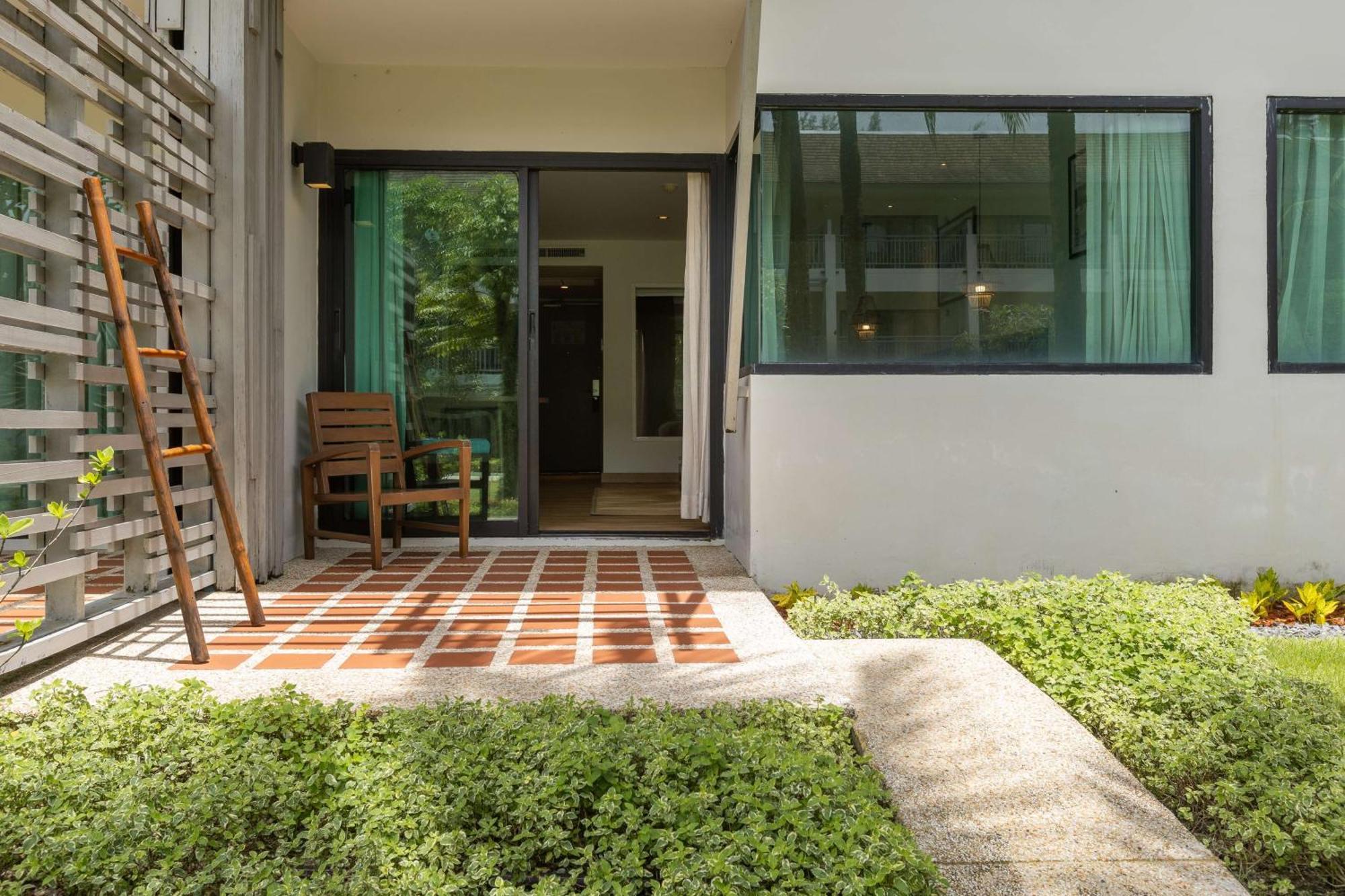 Outrigger Khao Lak Beach Resort - Sha Extra Plus מראה חיצוני תמונה A typical house in the village